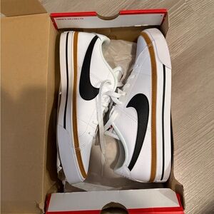 Nike Court Legacy Men’s White Sneakers with Black Swoosh and Brown Stripe